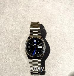 PRE-OWNED Seiko 5 Automatic Blue Dial Silver Stainless Steel Watch SNXS77K1
