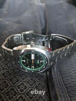 Seiko Men's SNKM97 Analog Green Dial Automatic Silver Watch